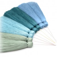 Hilos, borlas, plumas, canutillos, cordones