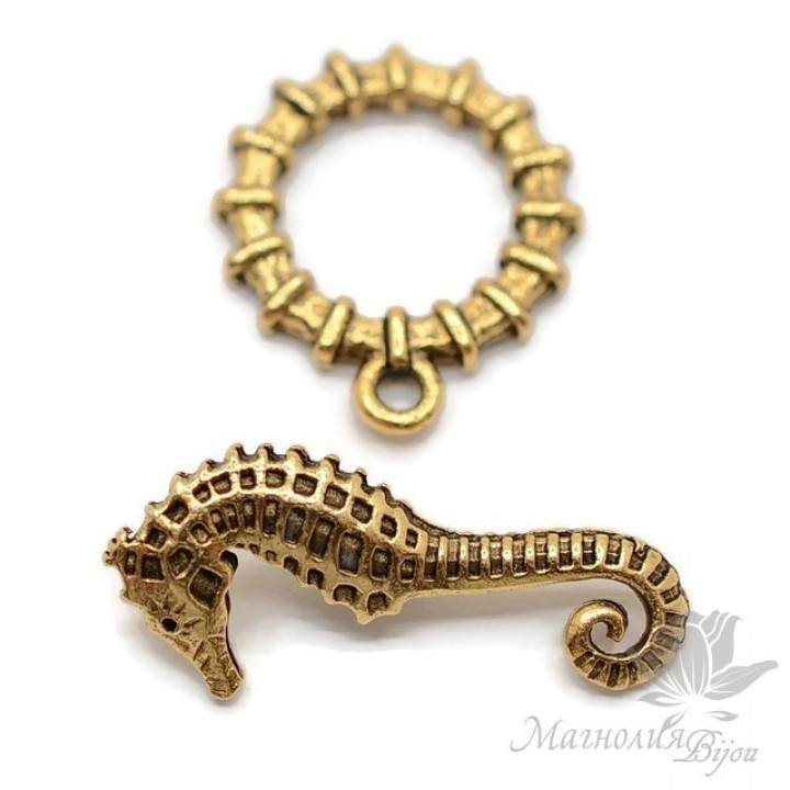 ТОГЛ "Морской конёк", античное золото